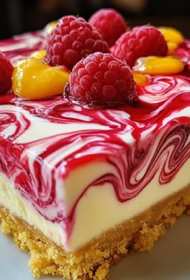 LEMON RASPBERRY SWIRL CHEESECAKE