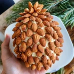 Pinecone cheeseball with almonds