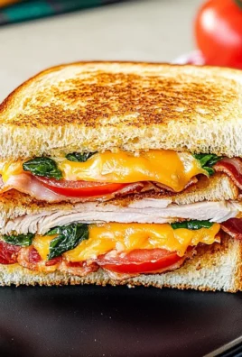 Turkey Melt with Cheddar, Spinach, and Bacon