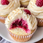 Almond Wedding Cake Cupcakes with Raspberry Filling